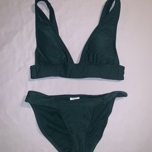 Dark green bikini with gold clasps, size small